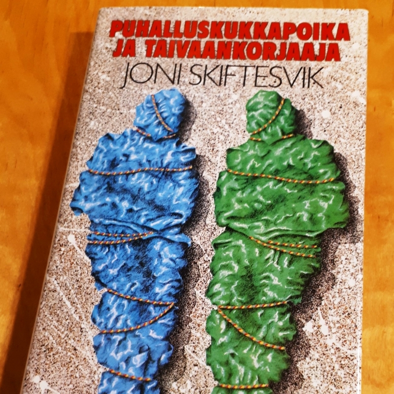 Puhalluskukkapoika ja taivaankorjaaja -kirjan kansi.